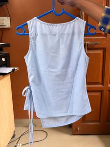 Light Blue Sleeveless Tie-Waist Top