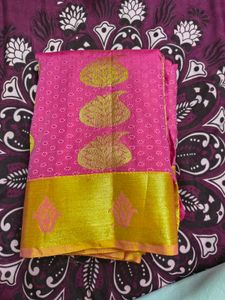 Vibrant Pink Saree with Golden Motifs