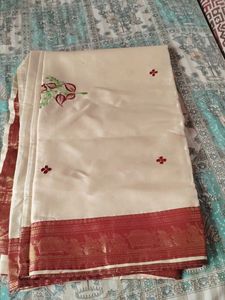 Elegant Cream Saree with Red Border