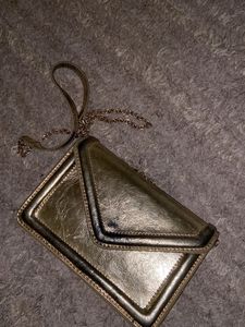 MANGO Gold sling Bag