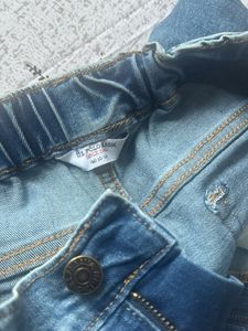 Distressed Blue Denim Jeans