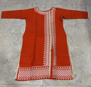 Elegant Orange Kurta with Intricate Embroidery