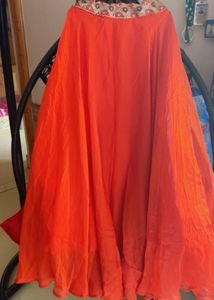 Flowing Orange Ethnic Skirt with choli and jacket