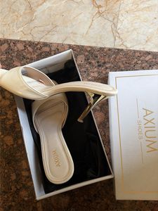 AXIUM Cream Heeled Mules