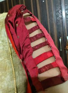 Elegant Red Saree with Gold Accents