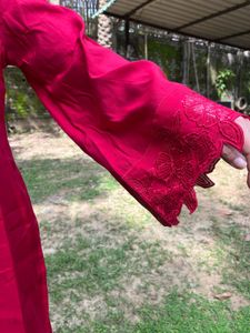 Beautiful Red Coords Set with price tag.