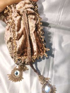 Elegant Embellished  velavte tassels Potli Bag