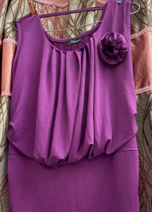 Elegant Purple Ruched Dress with Floral Accent