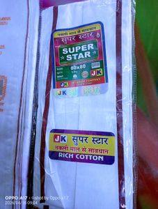 Century Fabrics white cotton dhoti , and towel
