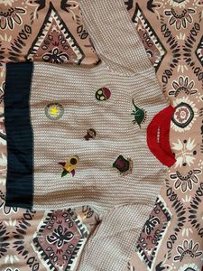 Whimsical Patched Sweater