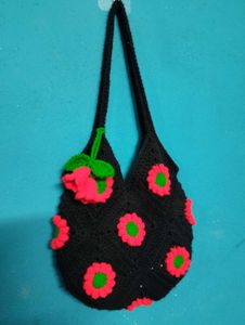 Crocheted Black Handbag with Floral Design