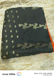 Elegant Black Saree with Floral Border
