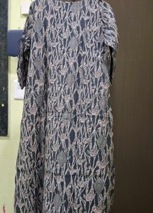 Elegant Printed Kurta with Embellished Neckline