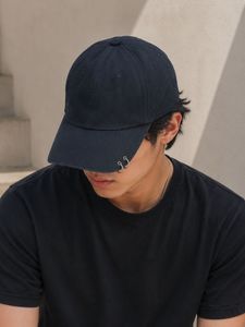 Stylish Navy Baseball Cap with Ring Detail