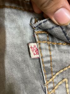 TRUE RELIGION WITH SMALL INK DOT AT BACK