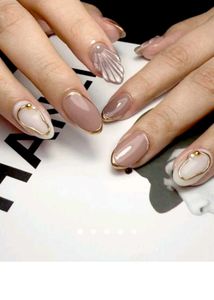 Elegant Almond Nails with Gold Accent