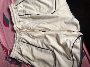 Cream Sweatshorts with Black Piping