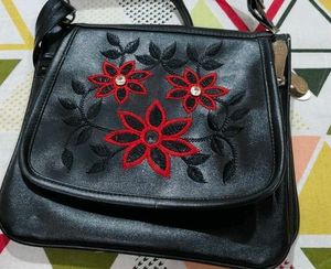 Chic Black Crossbody Bag with Floral Embroidery
