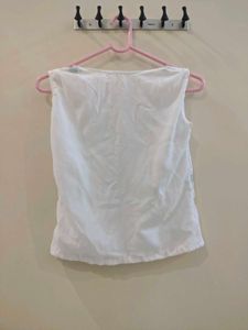 White Embroidered Sleeveless Blouse
