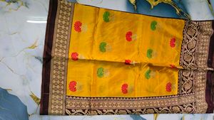 Vibrant Yellow Silk Saree with Floral Motifs