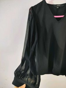 Vero Moda Black Sheer Sleeve Top with nude camisol