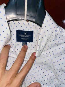 AMERICAN EAGLE OUTFITTERS White Polka Dot Button-D