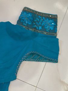 Beautiful Teal Saree with Embellishments