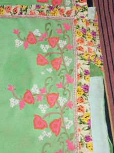 Beautiful Green Saree with Floral Embellishments