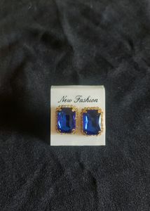 Classic Sapphire Earrings With Diamonds Around It