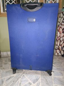 American Tourister Blue Suitcase