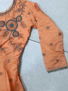Elegant Orange Embroidered Gown