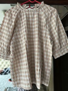 Chic Checkered Top with Ruffled Neck
