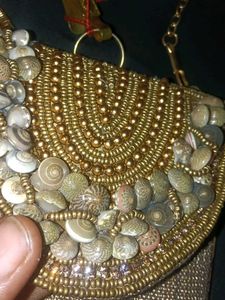 Elegant Golden Beaded Clutch