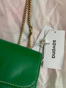 Green Crossbody Bag with Gold Chain.