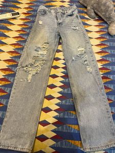 Light Wash Ripped Denim Jeans