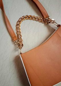 Chic Tan Crossbody Bag with Gold Chain