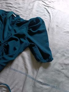 Elegant Teal Jumpsuit with Tie Detail