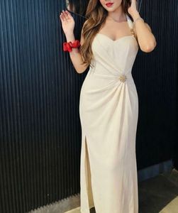 Elegant Cream Halter Neck Gown