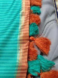 Elegant Teal Saree with Gold Motifs