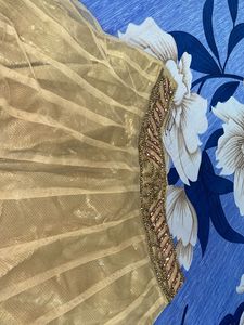 golden bridal type lehanga with blouse and duppata