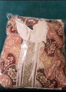 cream colour gharara and top with dupatta