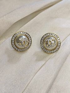 Elegant CC Pearl Stud Earrings