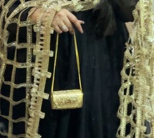 Elegant Gold Embellished Clutch Bag