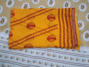 Vibrant Yellow Saree with Red Bandhani Print