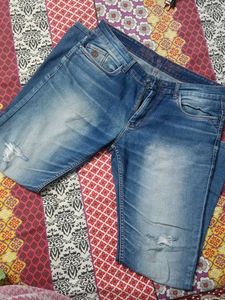 Distressed Blue Jeans