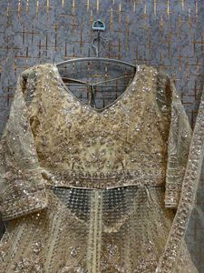 Amazing golden Peplum long Front Cut Lehga