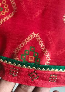 Elegant Red Saree with Golden Motifs
