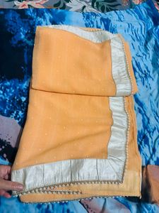 Peach Saree with Silver moti border
