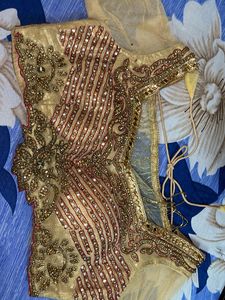 golden bridal type lehanga with blouse and duppata