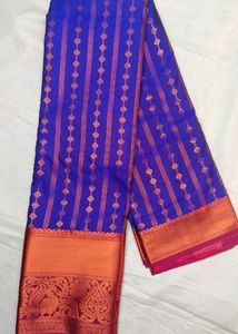 Vibrant Blue Silk Saree with Copper Border